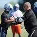 Lincoln head football coach Chris Westfall works with a player during practice at the school on Wednesday, August 14, 2013. Melanie Maxwell | AnnArbor.com